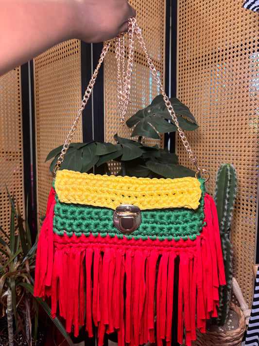Handmade yellow, black and green crochet clutch with gold chain strap